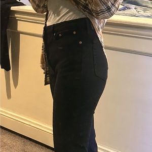 Black, distressed hem Wedgie jeans by Levi’s